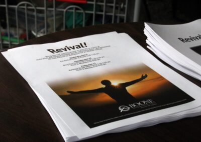 A stack of papers with a picture on top.